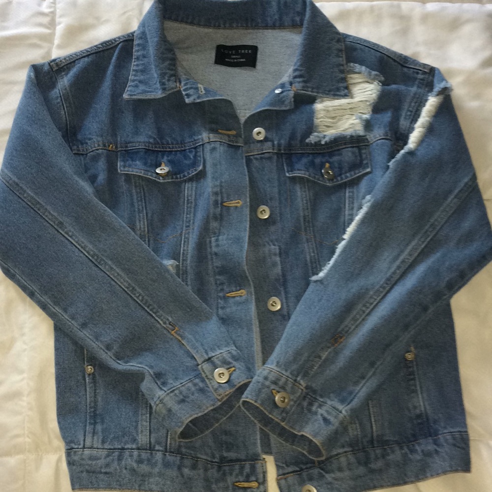 Distressed denim jacket